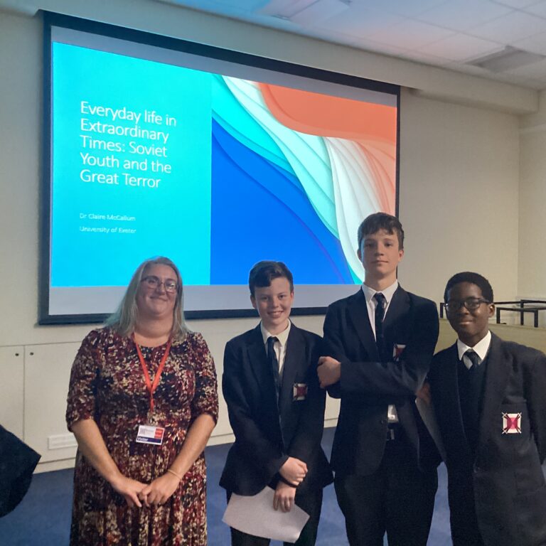students in front of a presentation
