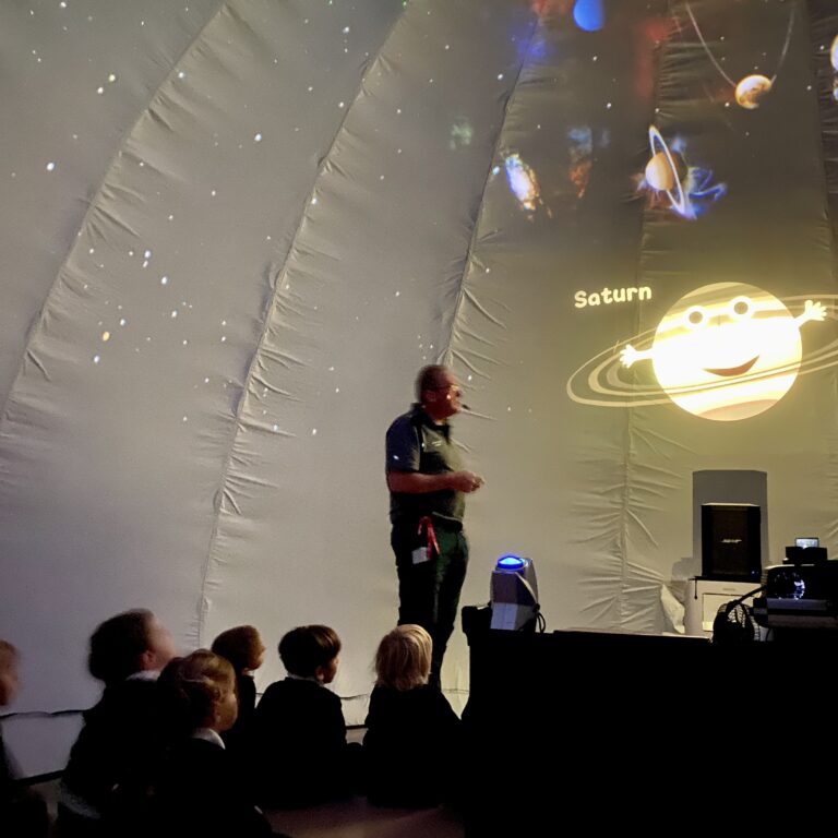 Student in planetarium