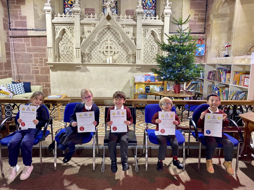 students with star of the week certificates