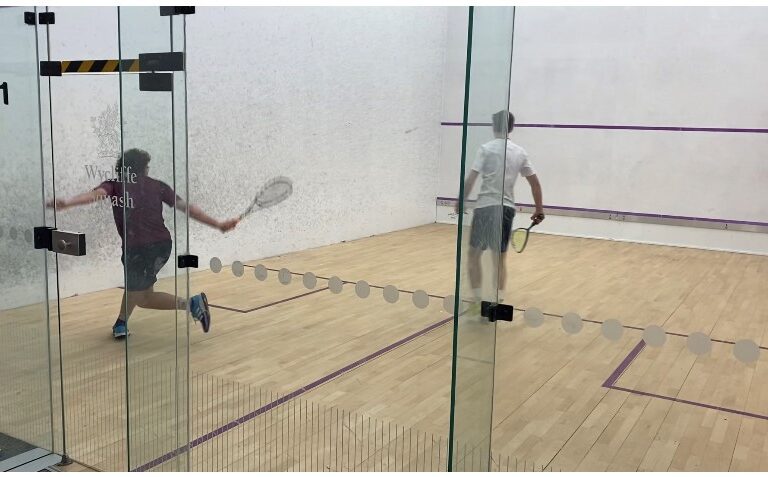 students playing squash
