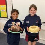 girls holding Bundt cakes