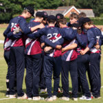 cricket match huddle