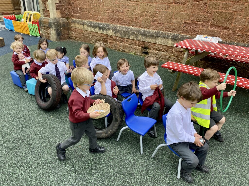 students pretending to drive a bus