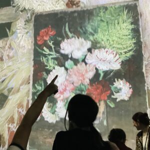 Children pointing at Van Gogh art