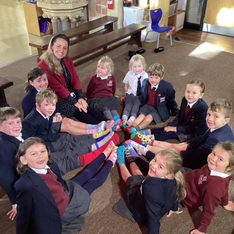 Pupils sat in circle wearing odd socks