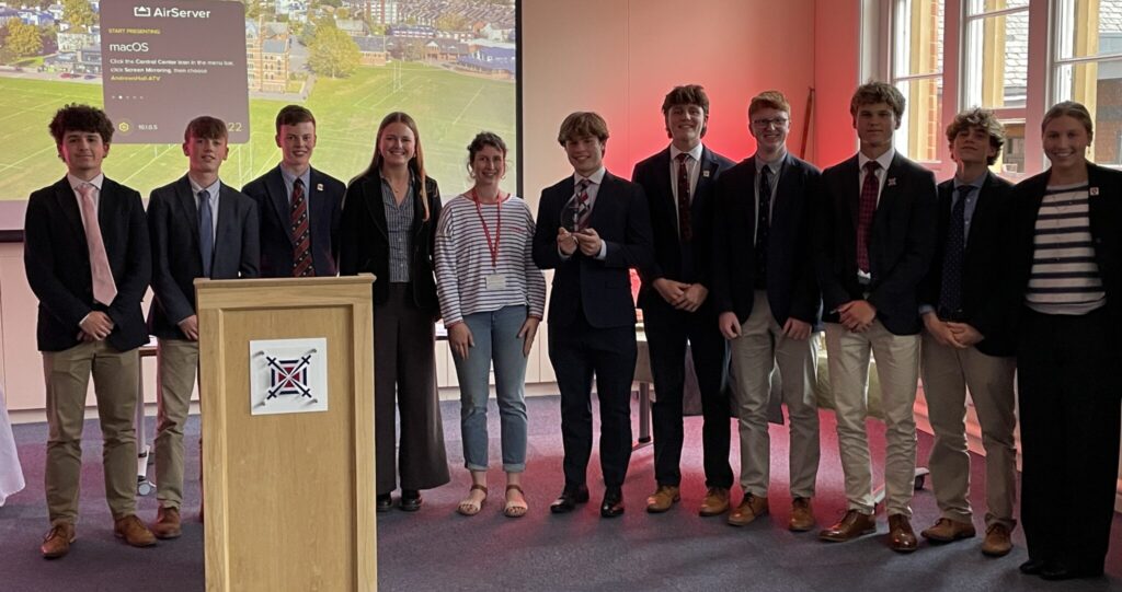 The Coast to Coast business group of pupils receiving their award
