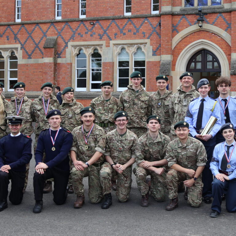 Group of pupils from all contingents of the CCF outside the red brick school building