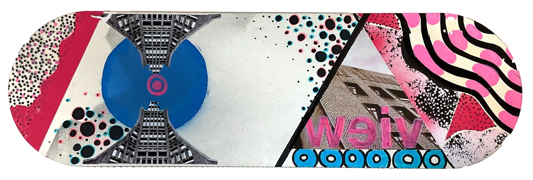 Abstract art collage on a skateboard deck: bold geometric shapes, pink and blue accents, polka dots, city-building motifs, and wavy patterns.
