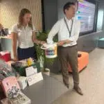 handing out raffle prizes