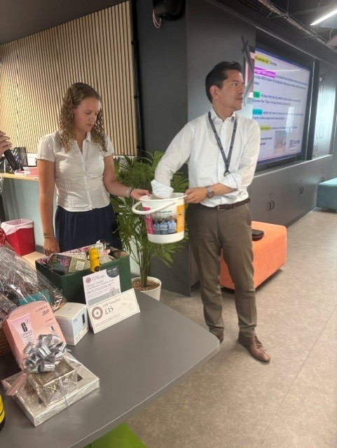 handing out raffle prizes