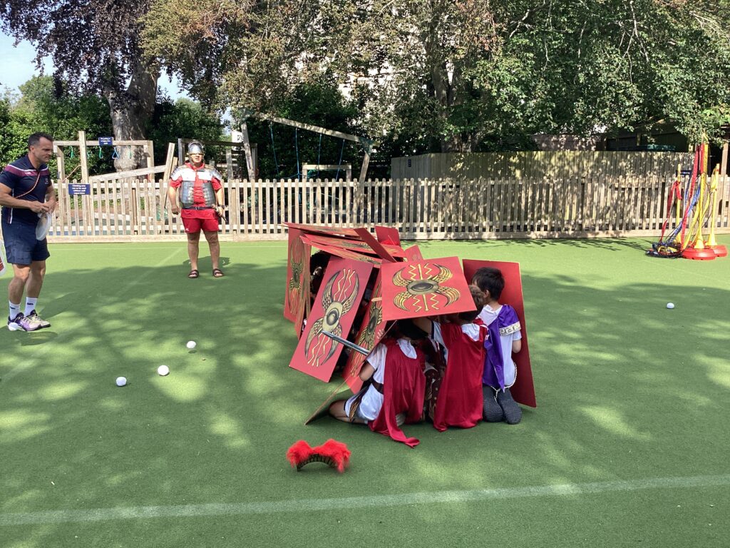 romans covered by shields