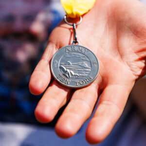 A ten tors medal in hand